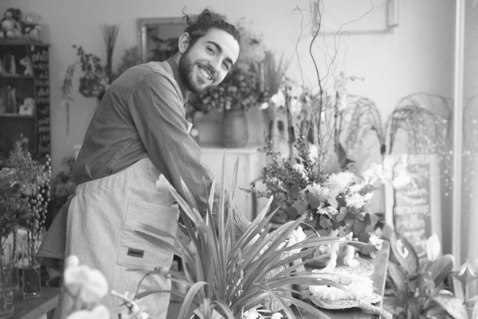 Game development workspace showing multiple monitors with Unity interface and project files